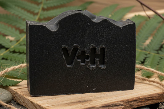 Black rubber gasket with 'H+A' branding on a white background