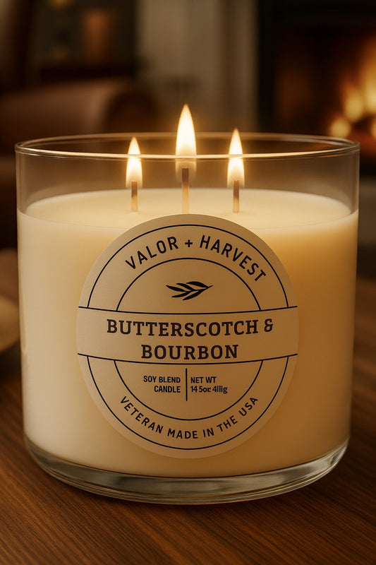 White Glass Butterscotch and Bourbon Scented Candle, front view.