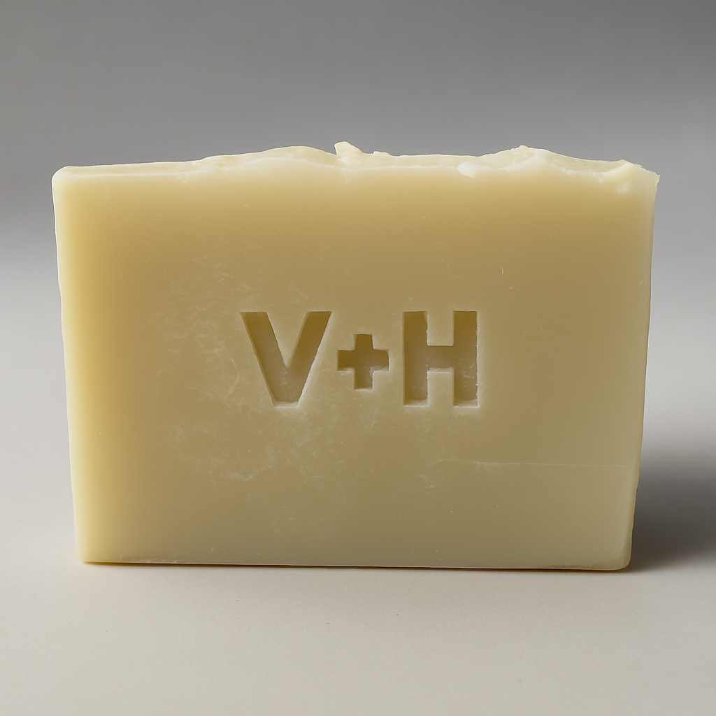 Lavender & Shea Butter Soap bar displayed in eco-friendly packaging—handcrafted with all-natural ingredients for soothing, moisturizing skincare. 2