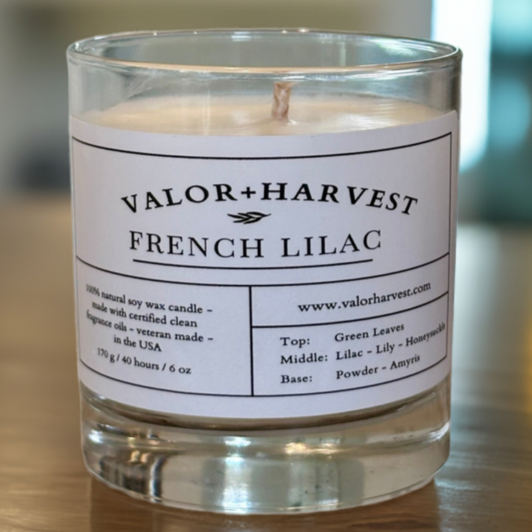Front view of French Lilac scented candle in elegant jar – soft floral aroma, refined and calming aesthetic