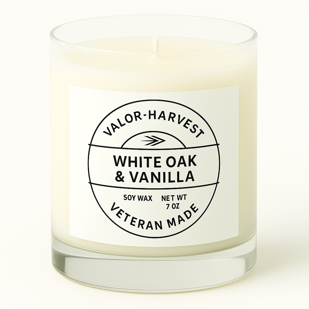 Candle with a label reading 'Valor-Harvest White Oak & Vanilla' on a white background