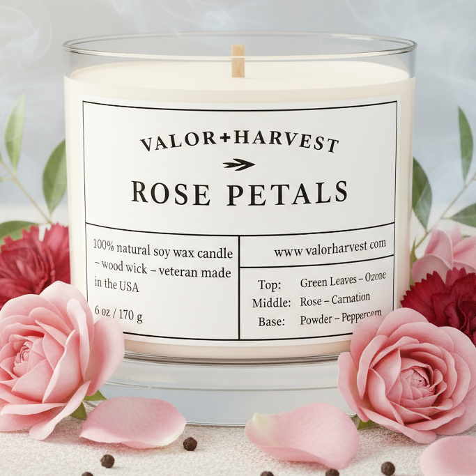 Rose Petals scented candle, front view, clear glass jar. 