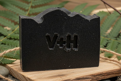 Black rubber gasket with 'H+A' branding on a white background