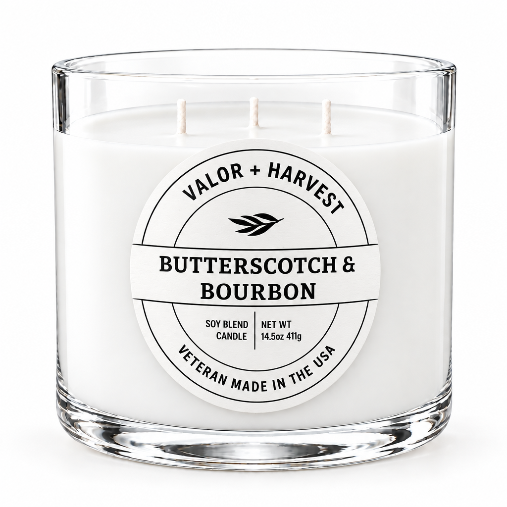 Valor+Harvest Butterscotch & Bourbon 3-wick soy blend candle in a clear glass jar