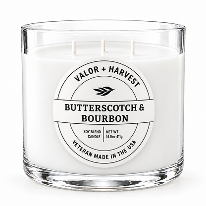 Valor+Harvest Butterscotch & Bourbon 3-wick soy blend candle in a clear glass jar