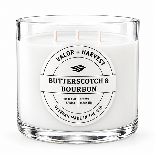 Valor+Harvest Butterscotch & Bourbon 3-wick soy blend candle in a clear glass jar