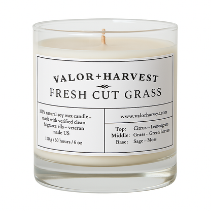 Fresh Cut Grass Soy Candle – 06oz front-facing view in clear glass jar with cotton wick, featuring nature-inspired label design and clean green tones.