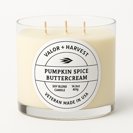 Candle with 'Valor + Harvest' label on a white background