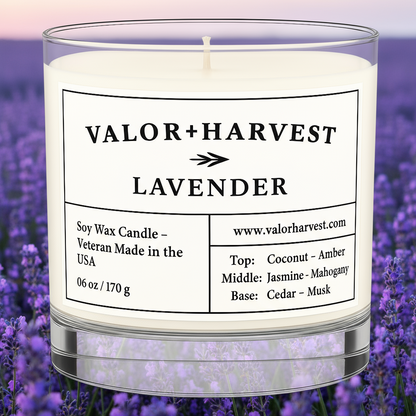 Lavender scented candle, front view, clear glass jar. 