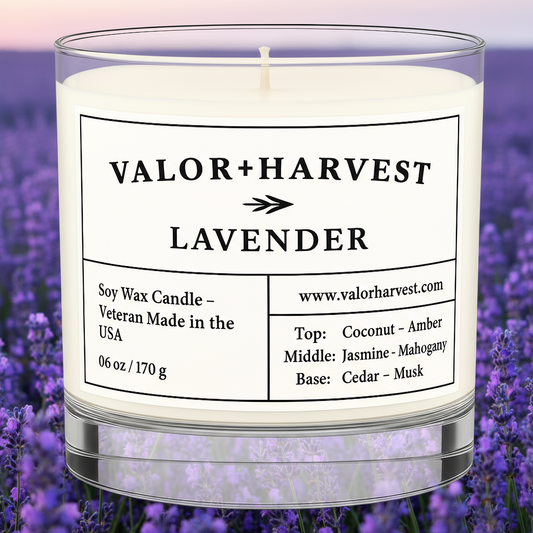 Lavender scented candle, front view, clear glass jar. 