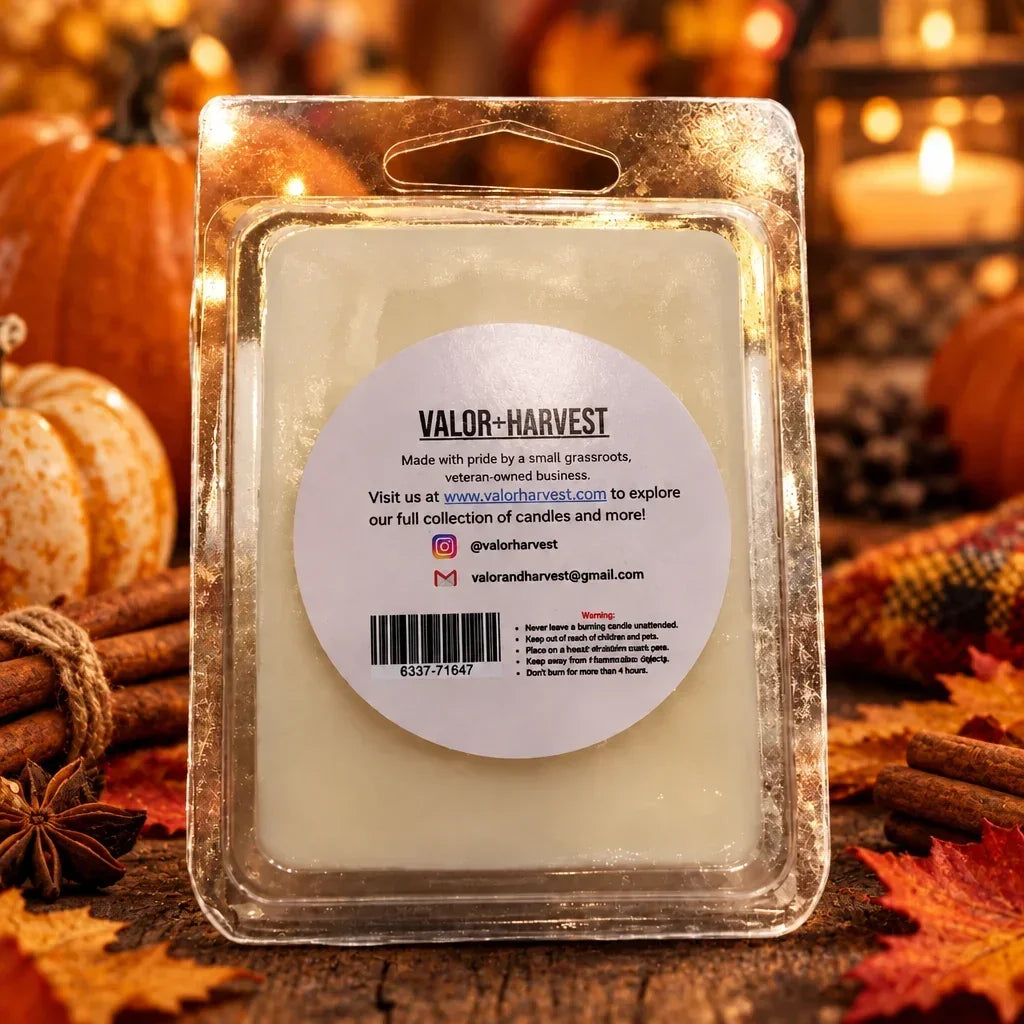 Valor+Harvest Pumpkin Spice soy wax melt in clear packaging surrounded by autumn decor.