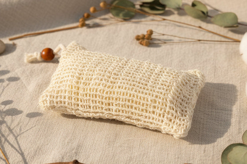 Sisal soap holder, cloth material, used for holding soap and creating lather when applied to water. 